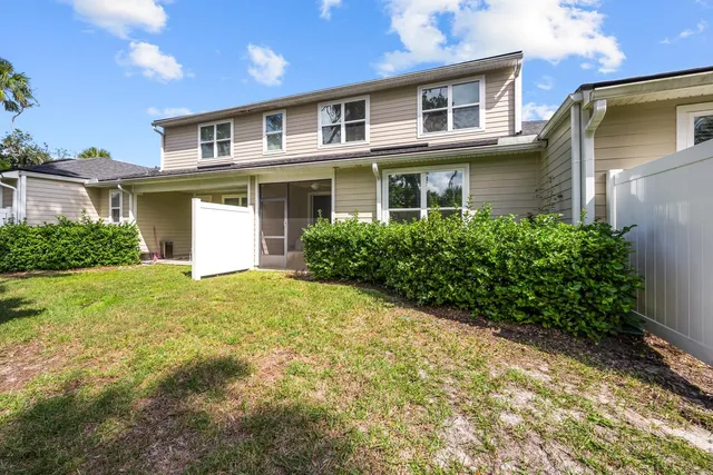 an aerial view of a house with swimming pool