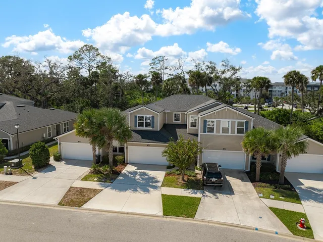 a view of balcony with wooden floor and iron stairs