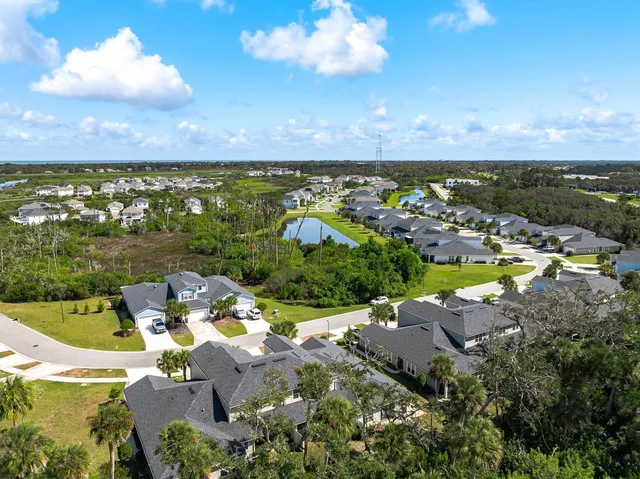 a view of a balcony with wooden floor