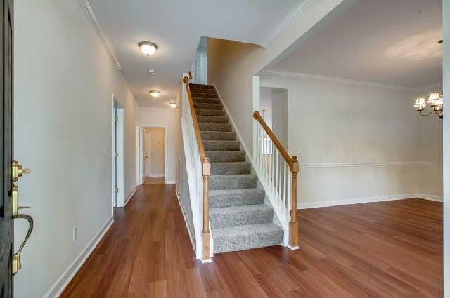 1702 Decatur Circle Franklin, TN 37067 - Photo 3 of 20 This gorgeous entry with NEW carpet and attractive, durable laminate wood floor runs throughout the main areas downstairs.