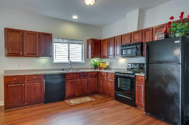 1702 Decatur Circle Franklin, TN 37067 - Photo 20 of 20 Open floor plan complete with upgraded cherry cabinets, and Corian countertops.