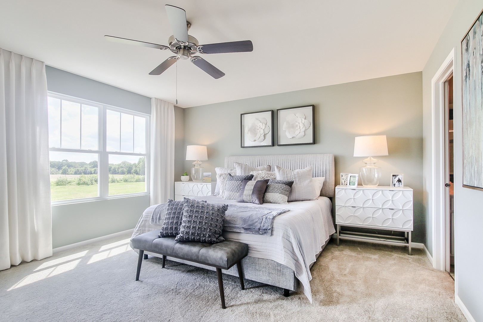 1033 Sharp Drive, Unit 1609 Plano, IL 60545 - Photo 23 of 35 a bedroom with a bed and a couch