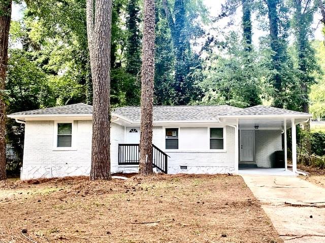 3350 Pinehill Drive Decatur, GA 30032 - Photo 1 of 1 a house with trees in the background