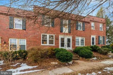 a view of a building with a garden