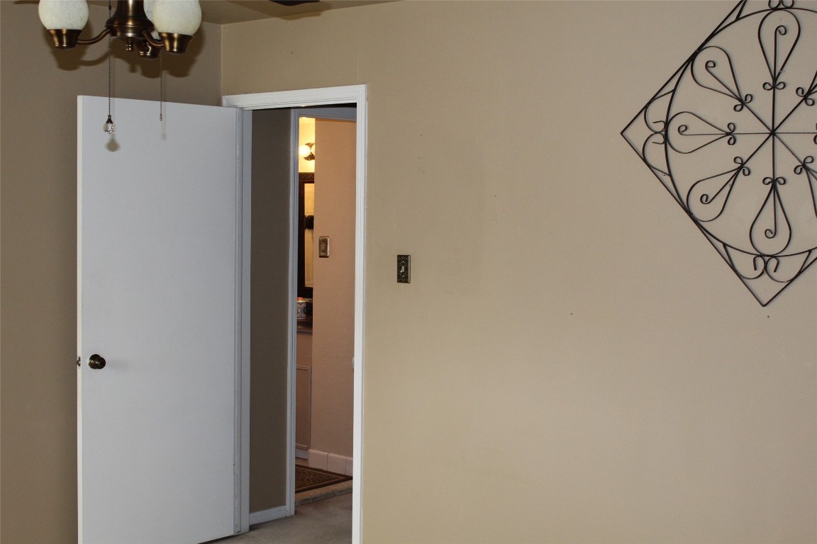 3706 Cypresswood Drive Spring, TX 77388 - Photo 14 of 30 a view of a hallway with wooden floor and entryway