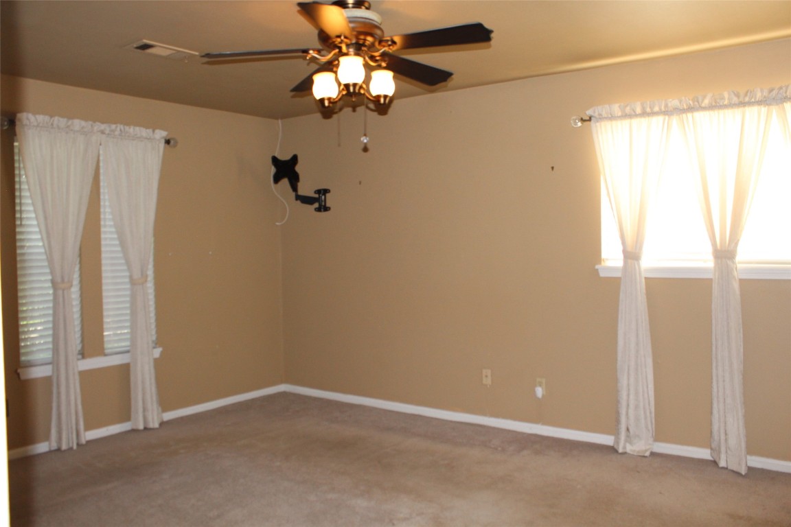 3706 Cypresswood Drive Spring, TX 77388 - Photo 17 of 30 a view of an empty room with a window