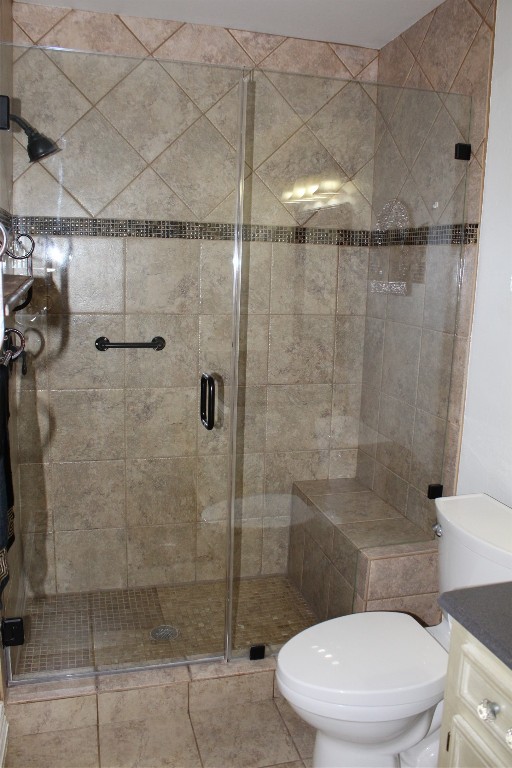 3706 Cypresswood Drive Spring, TX 77388 - Photo 19 of 30 a white toilet next to a bathroom shower