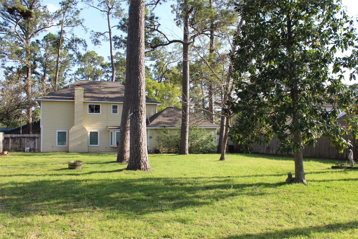 3706 Cypresswood Drive Spring, TX 77388 - Photo 29 of 30 a view of a house with a big yard and large trees