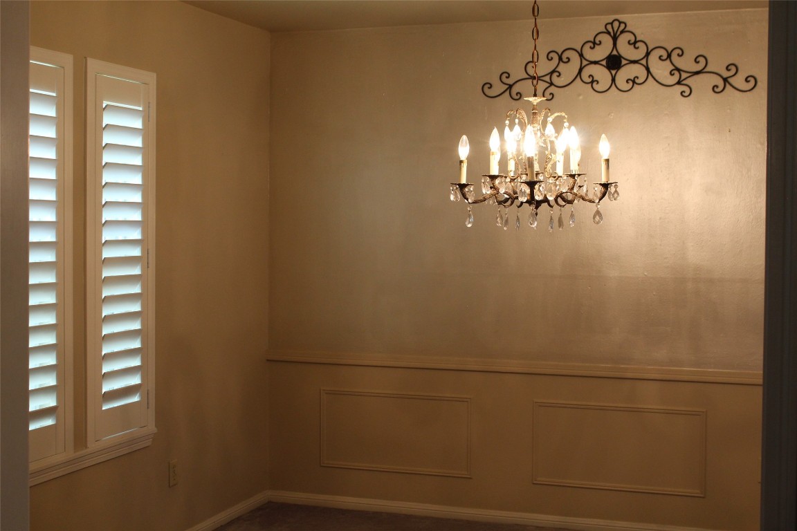 3706 Cypresswood Drive Spring, TX 77388 - Photo 7 of 30 a view of a room with a ceiling fan and window