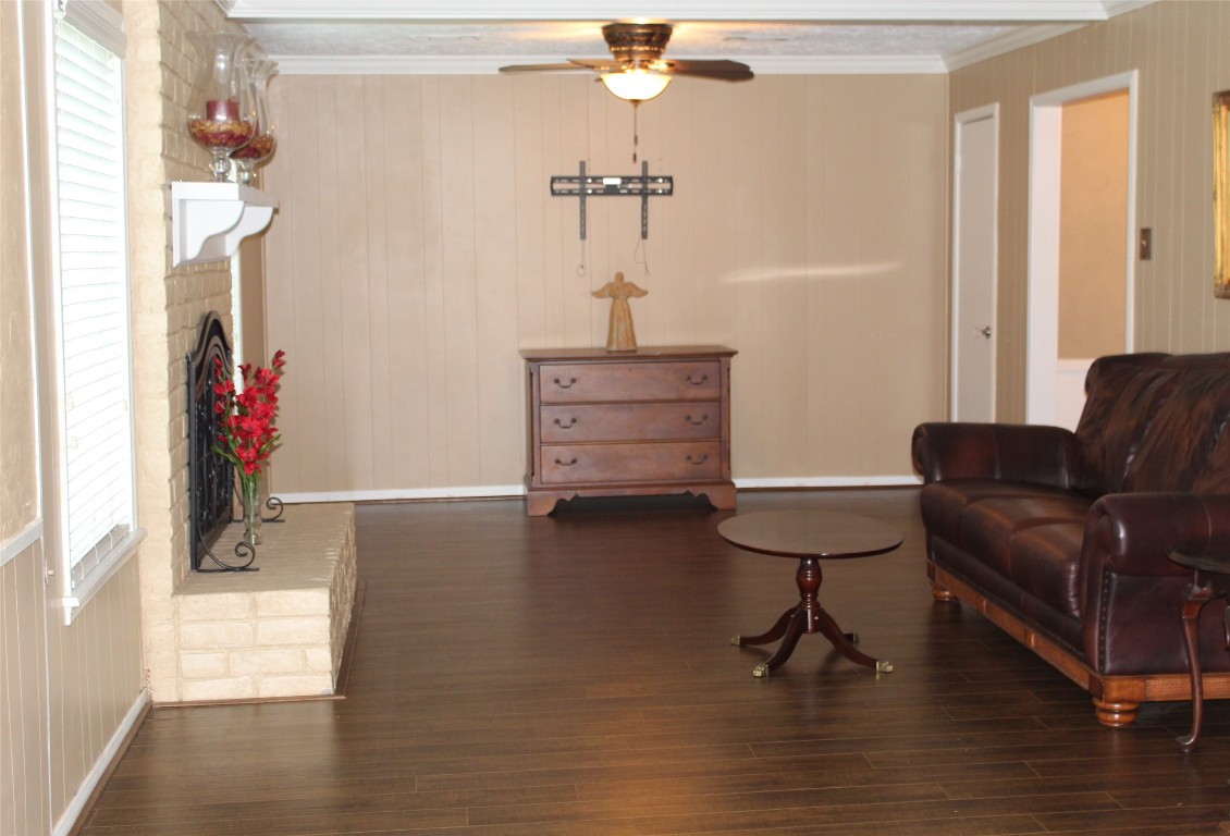 3706 Cypresswood Drive Spring, TX 77388 - Photo 10 of 30 a room with furniture and a wooden floor
