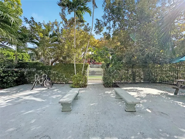 a view of a house with a street
