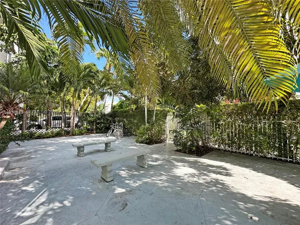 a view of a garden with trees