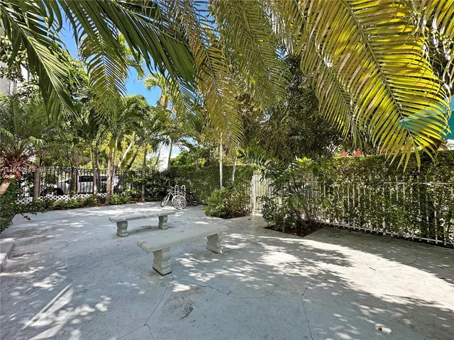 a view of a garden with trees