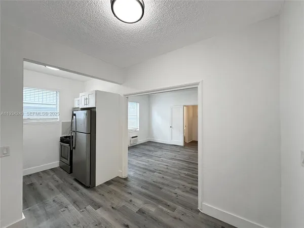 a view of a storage & utility room with closet