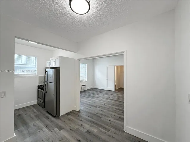 a view of a storage & utility room with closet