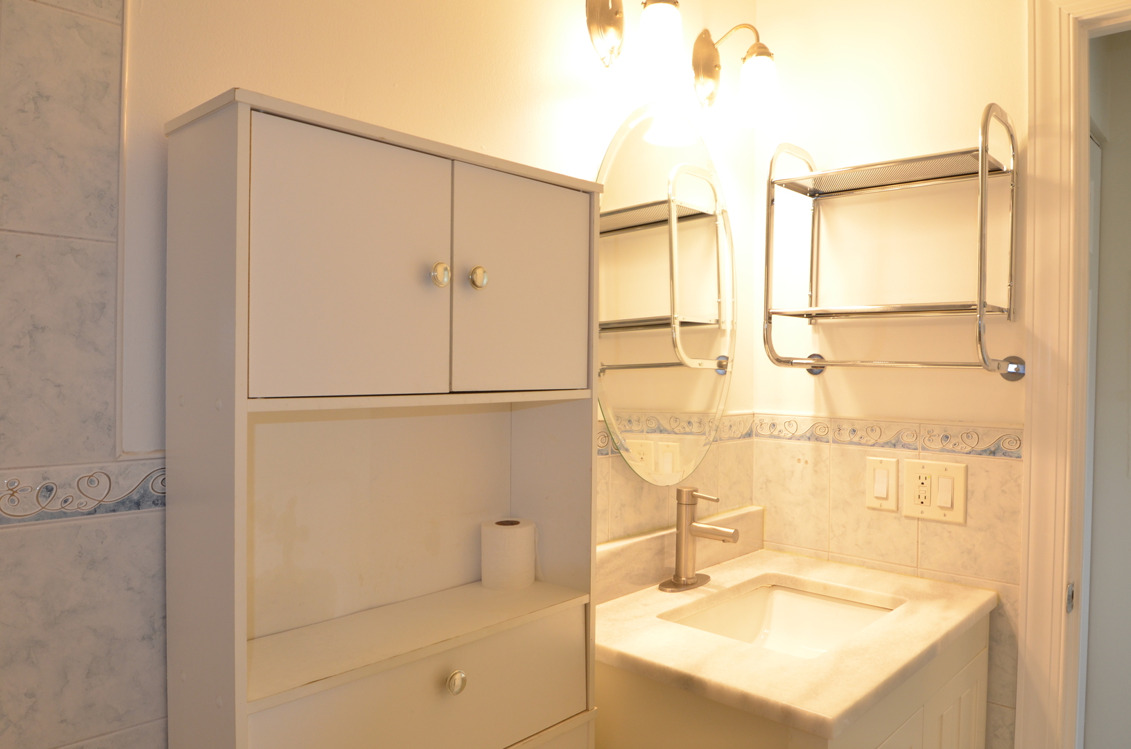 826 East Old Willow Road, Unit 206 Prospect Heights, IL 60070 - Photo 15 of 15 a bathroom with a sink and a shower
