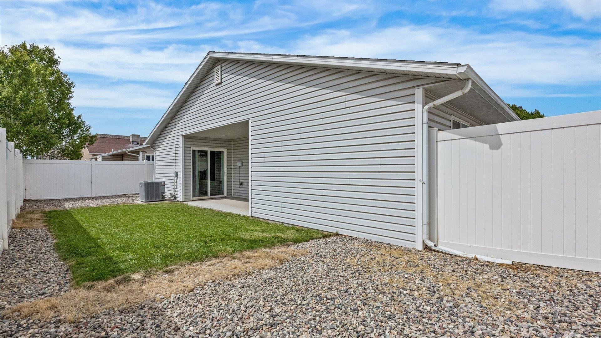 420-29 29 1/2 Road Grand Junction, CO 81504 - Photo 23 of 26 a view of a house with a small yard
