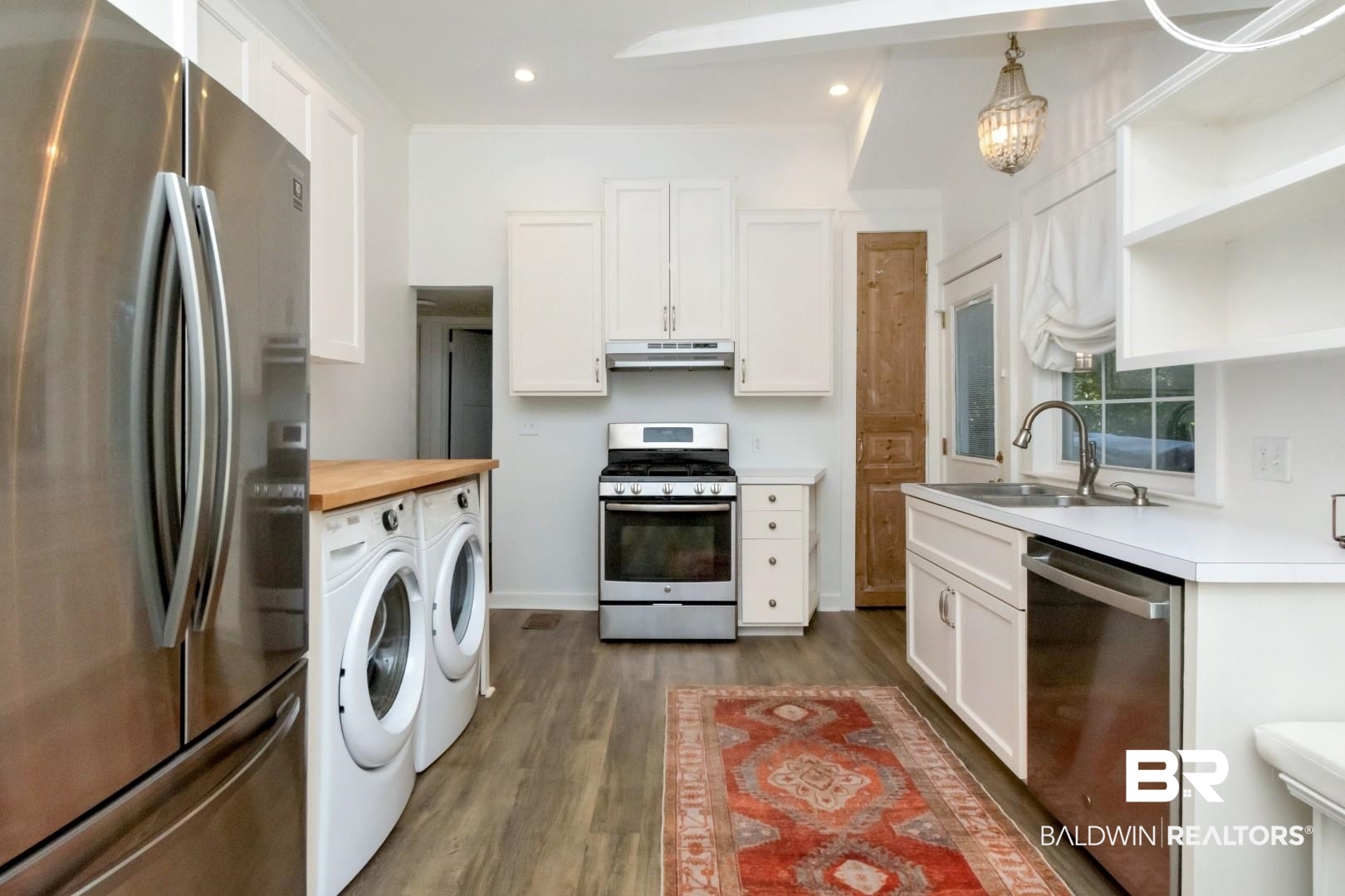 16 Princess Anne Road Mobile, AL 36608 - Photo 14 of 40 Kitchen featuring stainless steel appliances, white cabinetry, open shelves, light wood-style floors, and recessed lighting