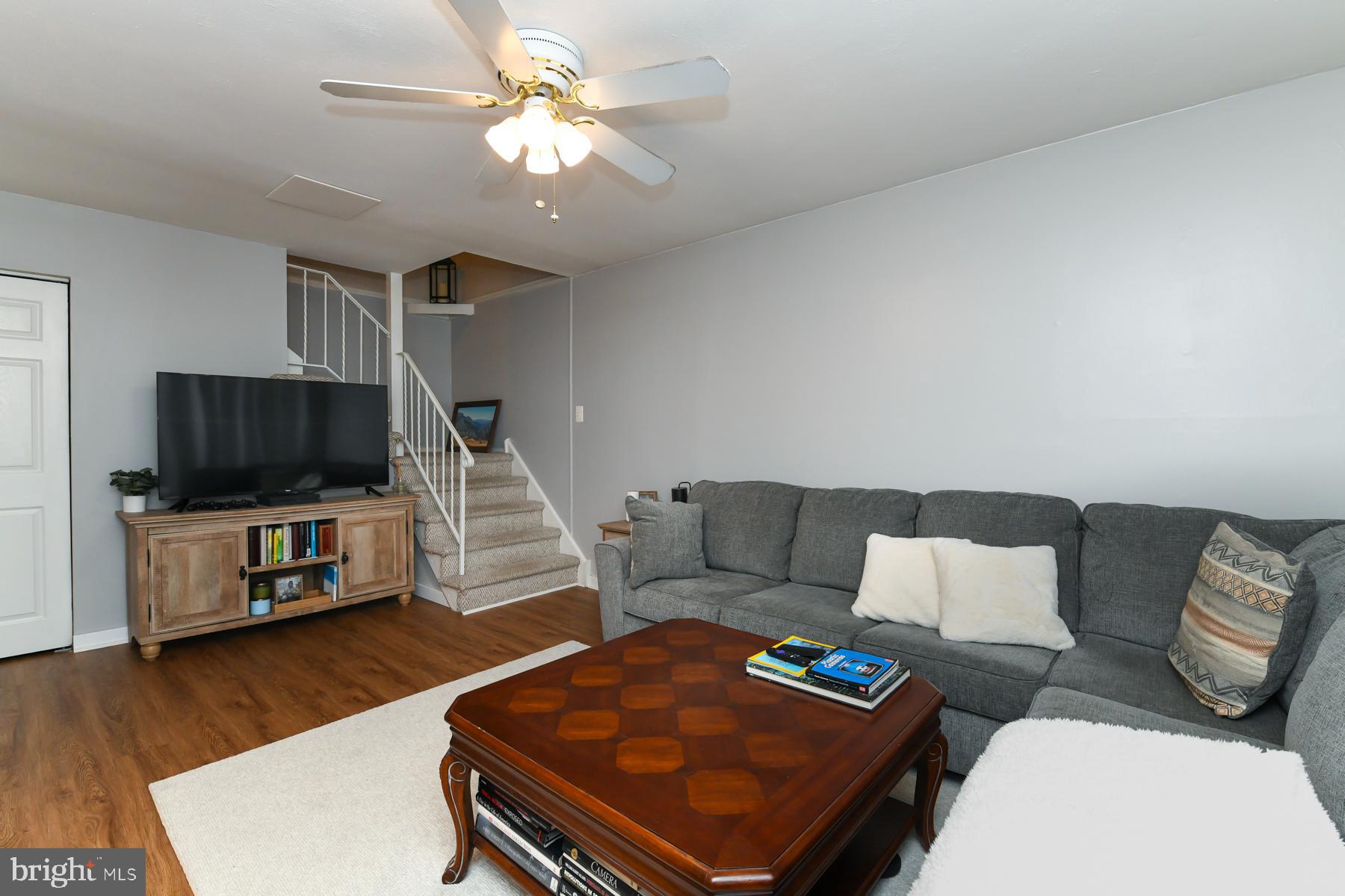 87 Woodway Drive West Deptford, NJ 08066 - Photo 9 of 18 a living room with furniture and a flat screen tv