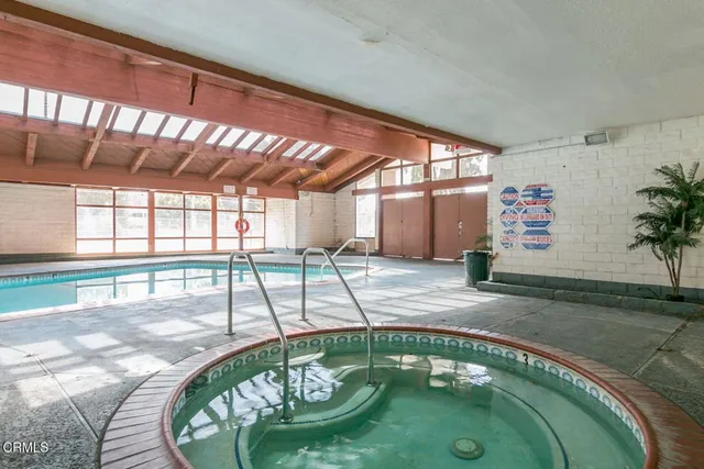 a swimming pool with view of outdoor space