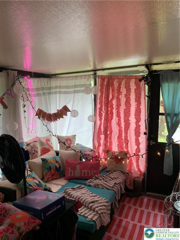 127 Pine Cone Trail Scotrun, PA 18355 - Photo 18 of 24 a bedroom with a bed and a window