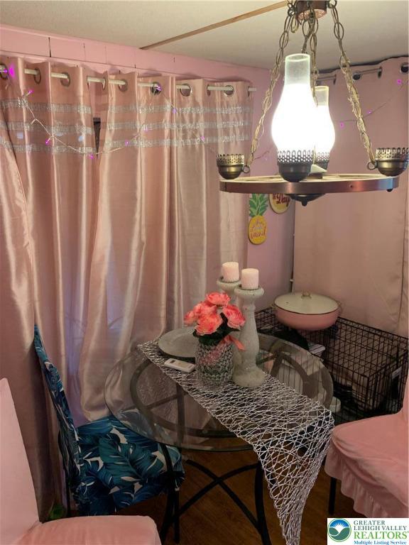 127 Pine Cone Trail Scotrun, PA 18355 - Photo 5 of 24 a bathroom with a sink a toilet and shower curtain