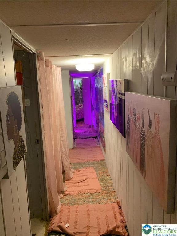 127 Pine Cone Trail Scotrun, PA 18355 - Photo 6 of 24 a view of a hallway with windows