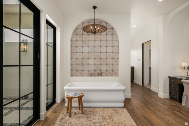 4871 South Homestead Way Washington, UT 84780 - Photo 41 of 151 Bathroom with a freestanding tub, dark wood-type flooring, and vanity