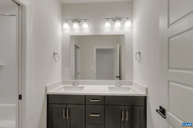 a bathroom with a bathtub and a toilet