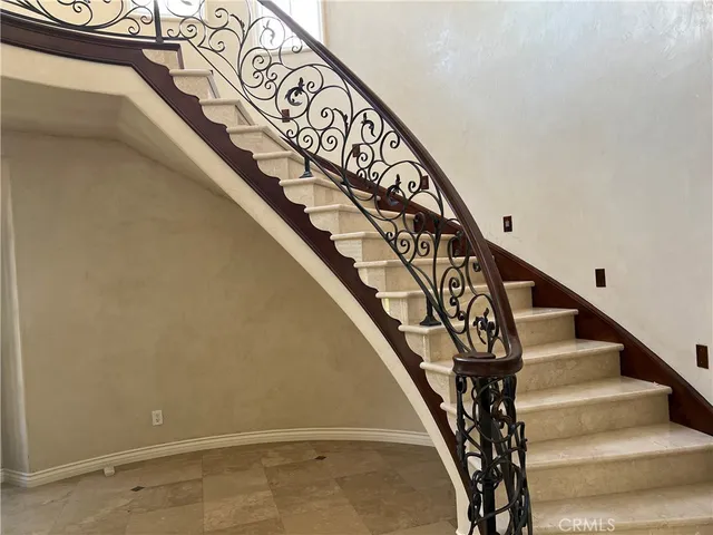 a view of a balcony with an ocean view