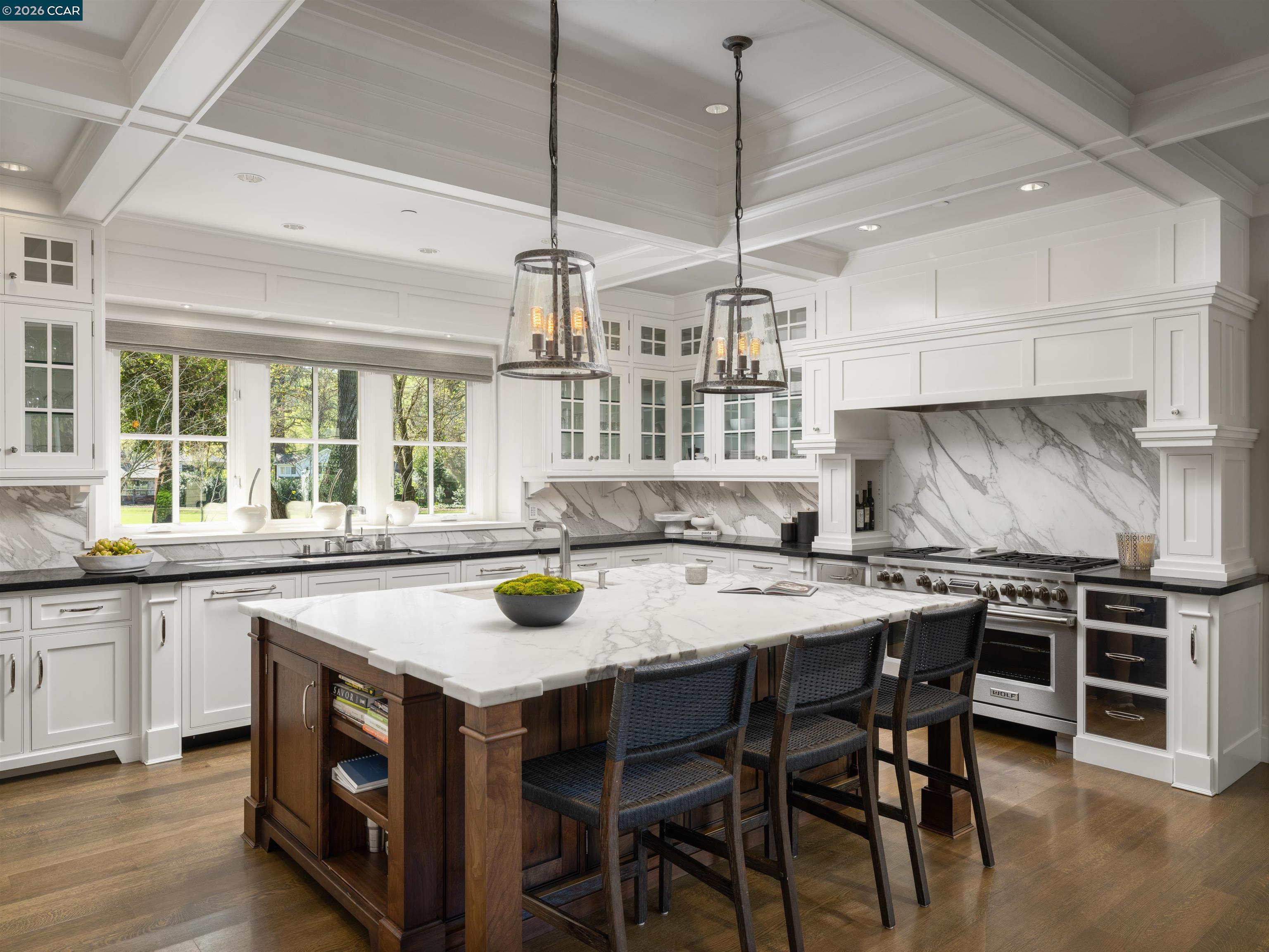 Diablo Diablo, CA 94528 - Photo 11 of 41 a kitchen with a stove a table and chairs in it