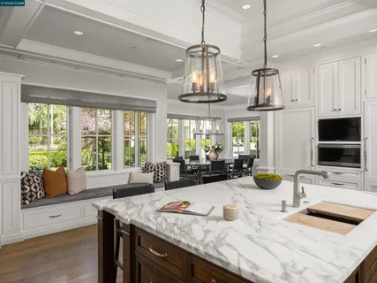 a kitchen with sink and window