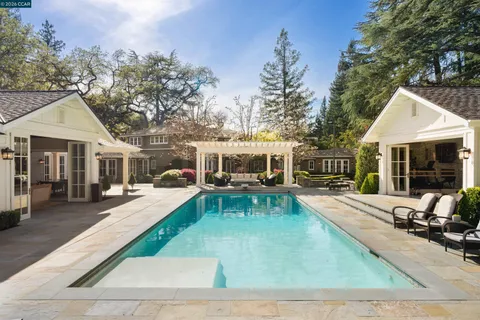 a view of a house with sitting area and furniture
