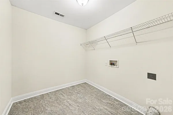 a view of a room with racks on the wall