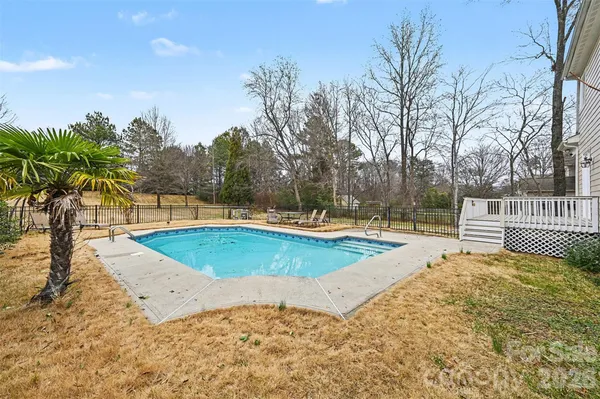 a view of a swimming pool with an outdoor space