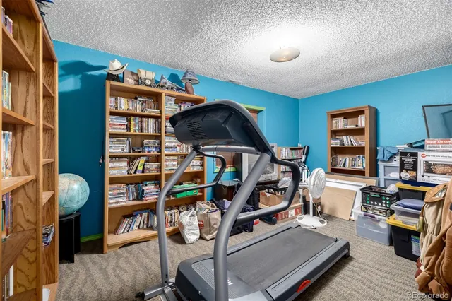 a view of a workspace with furniture