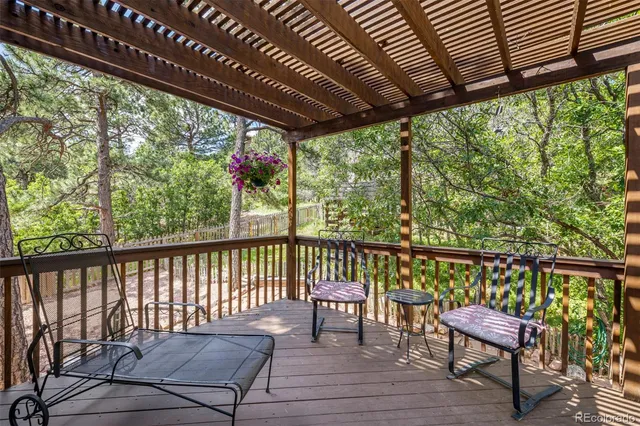a view of playground space with playground and green space