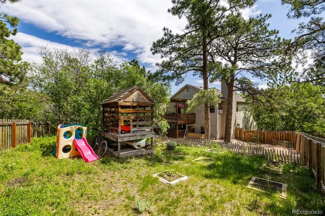 a backyard of a house with lots of green space