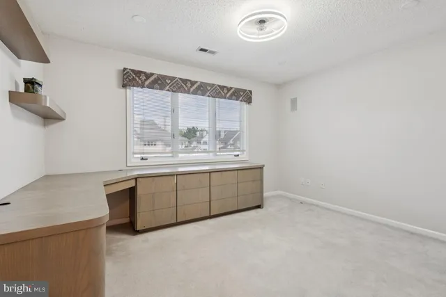 a room with a dresser