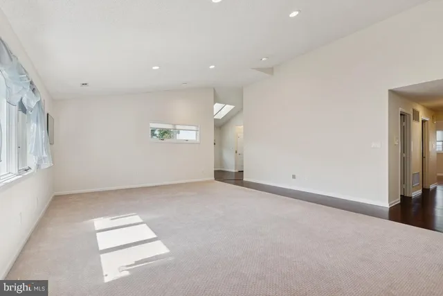 an empty room with windows