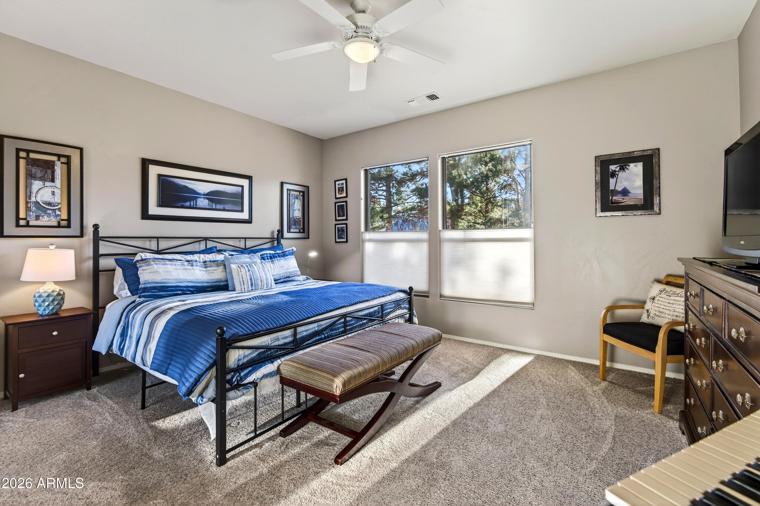 345 Merry Go Round Rock Road Sedona, AZ 86351 - Photo 20 of 43 a bedroom with a bed and a window