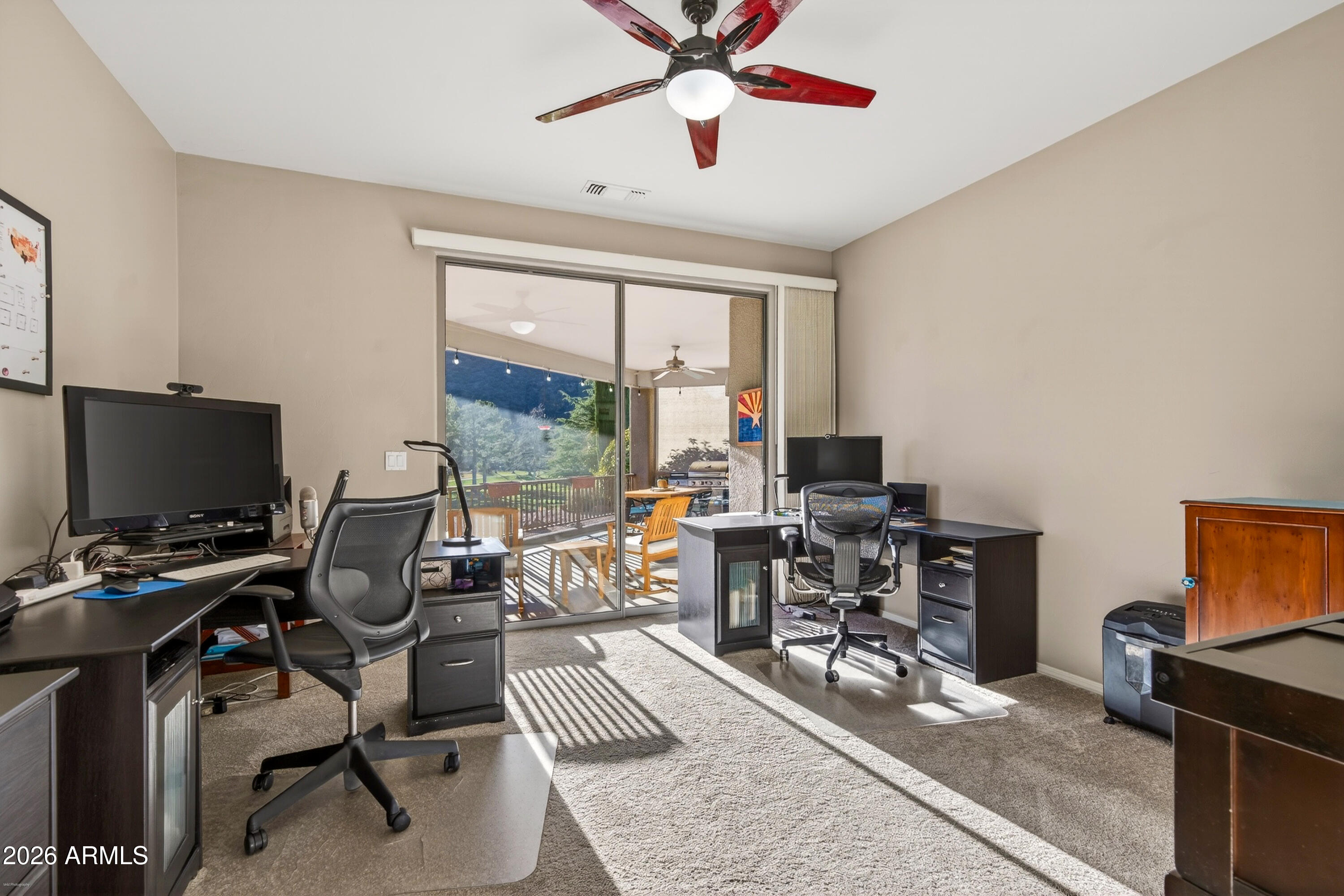 345 Merry Go Round Rock Road Sedona, AZ 86351 - Photo 23 of 43 a view of a workspace with furniture and a window