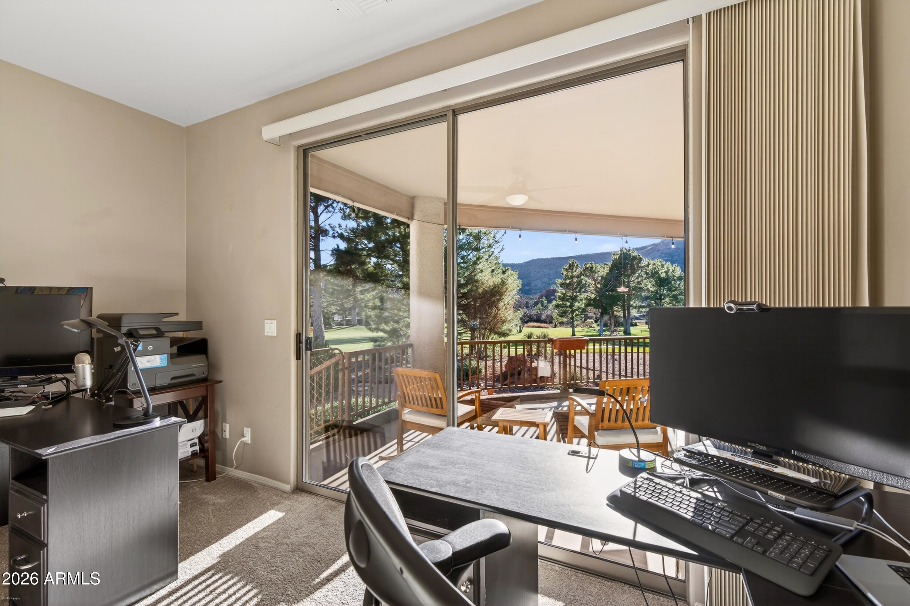 345 Merry Go Round Rock Road Sedona, AZ 86351 - Photo 24 of 43 a workspace with furniture and a flat screen tv