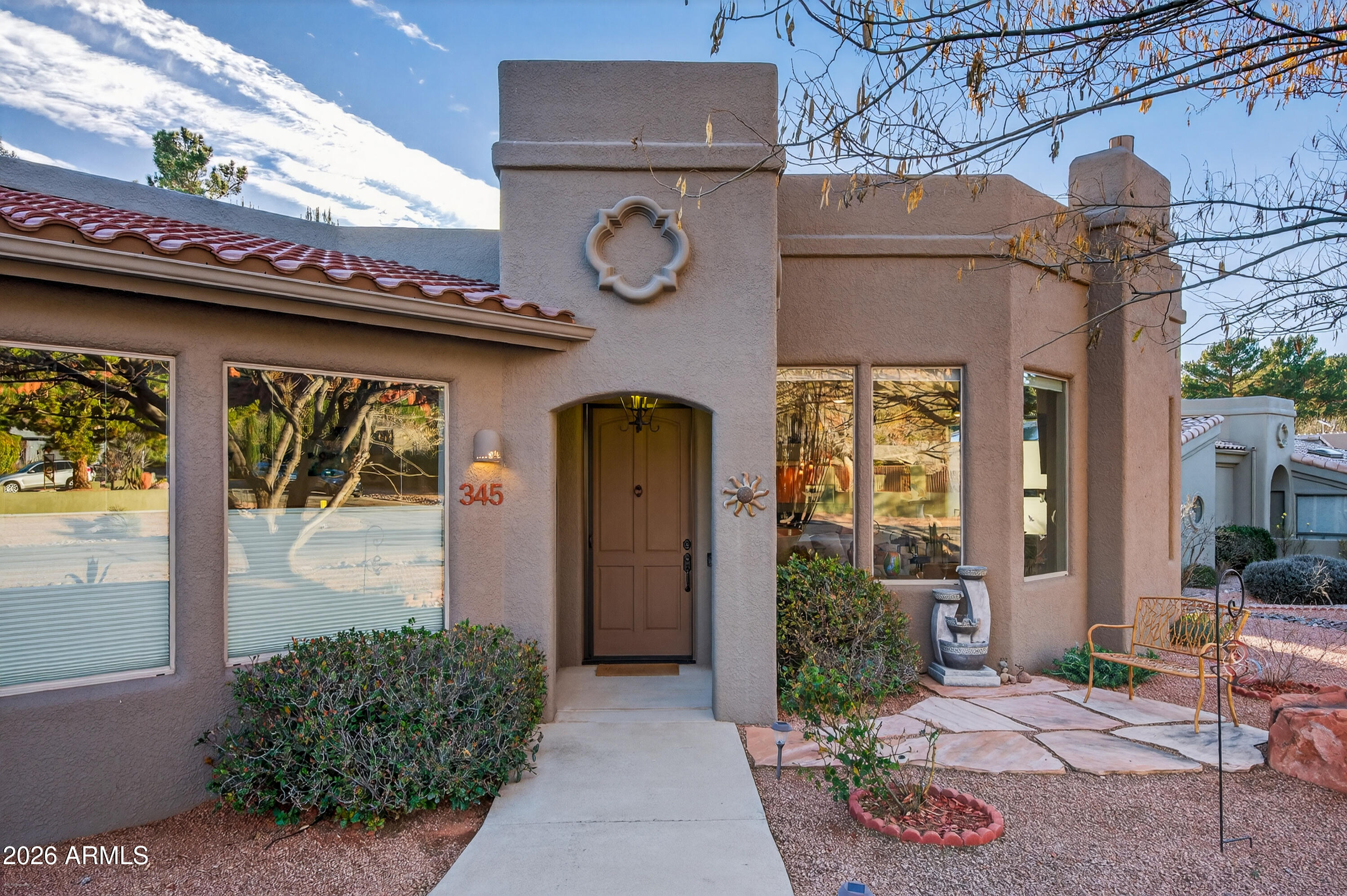 345 Merry Go Round Rock Road Sedona, AZ 86351 - Photo 3 of 43 a front view of a building with shower