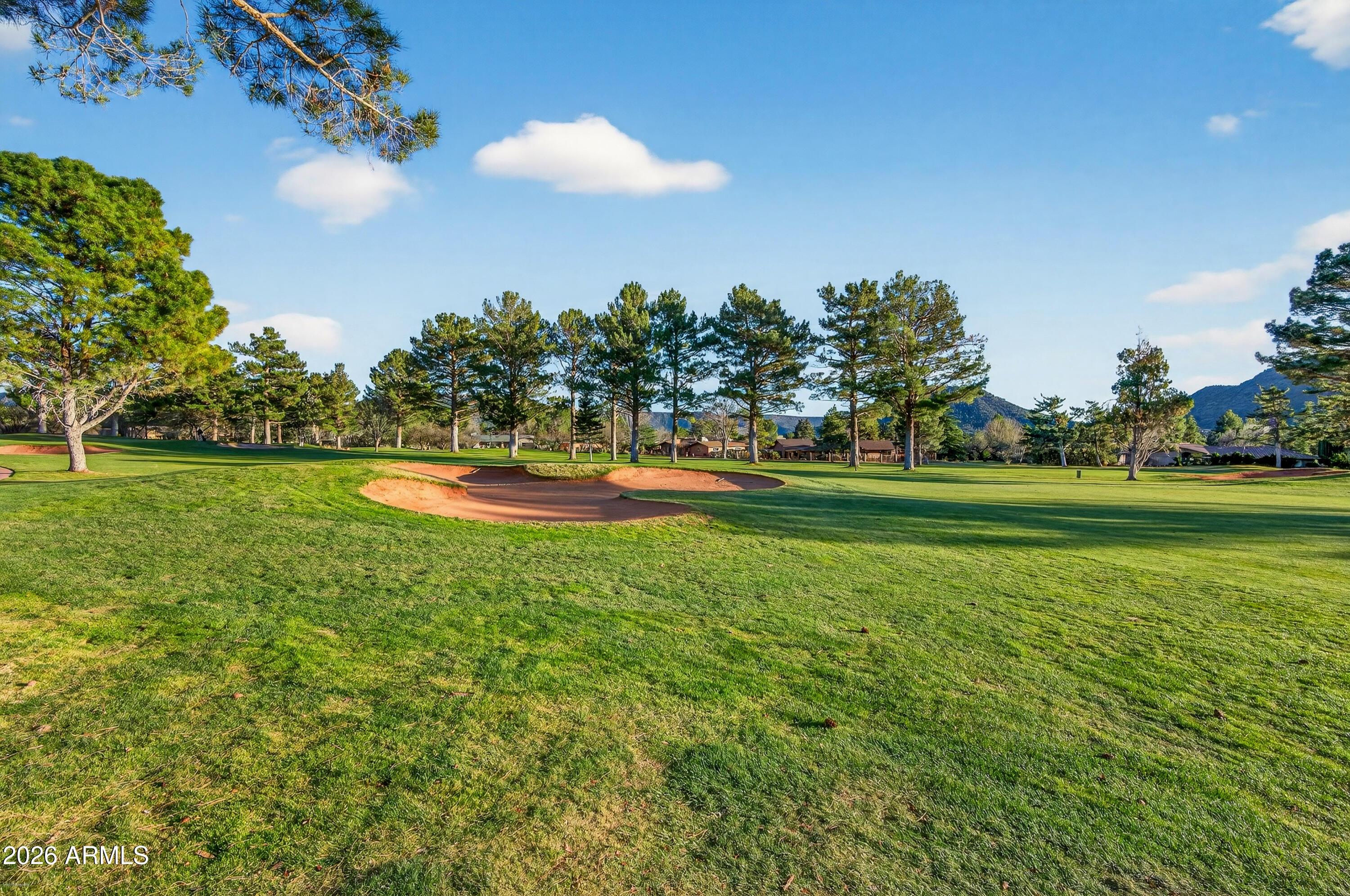 345 Merry Go Round Rock Road Sedona, AZ 86351 - Photo 32 of 43 a view of a golf course