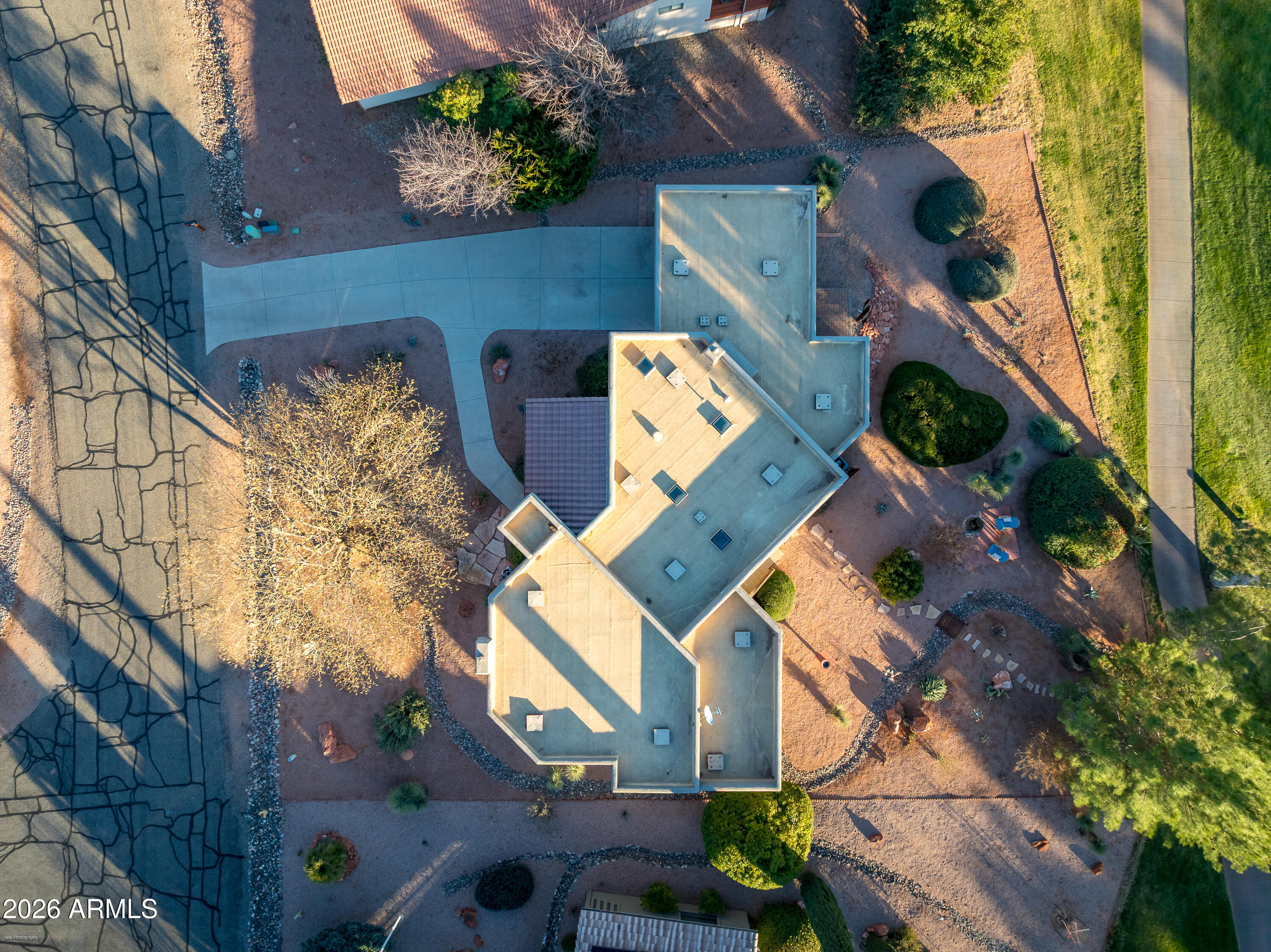 345 Merry Go Round Rock Road Sedona, AZ 86351 - Photo 43 of 43 an aerial view of a house with a yard