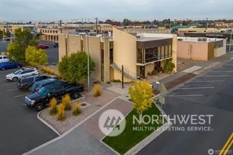an aerial view of a house with swimming pool
