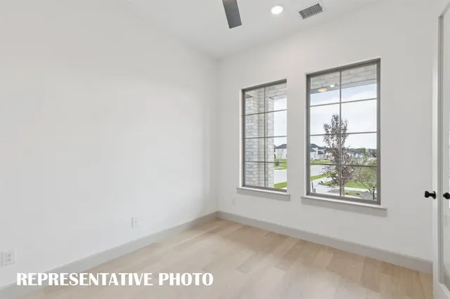 an empty room with windows