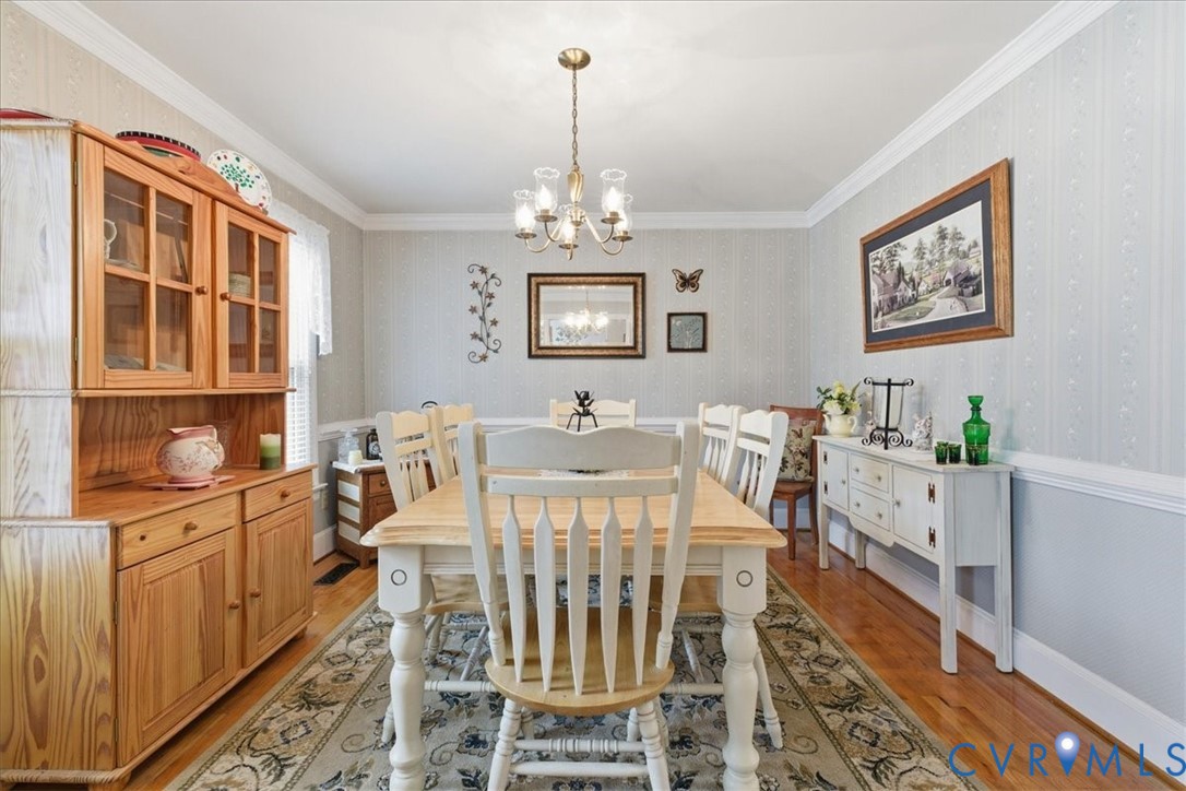 14110 Howlett Line Drive Colonial Heights, VA 23834 - Photo 12 of 44 a view of a dining room with furniture window and wooden floor