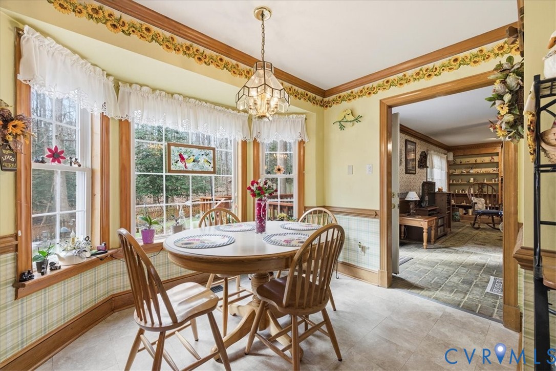 14110 Howlett Line Drive Colonial Heights, VA 23834 - Photo 18 of 44 a view of a dining room with furniture window and outside view